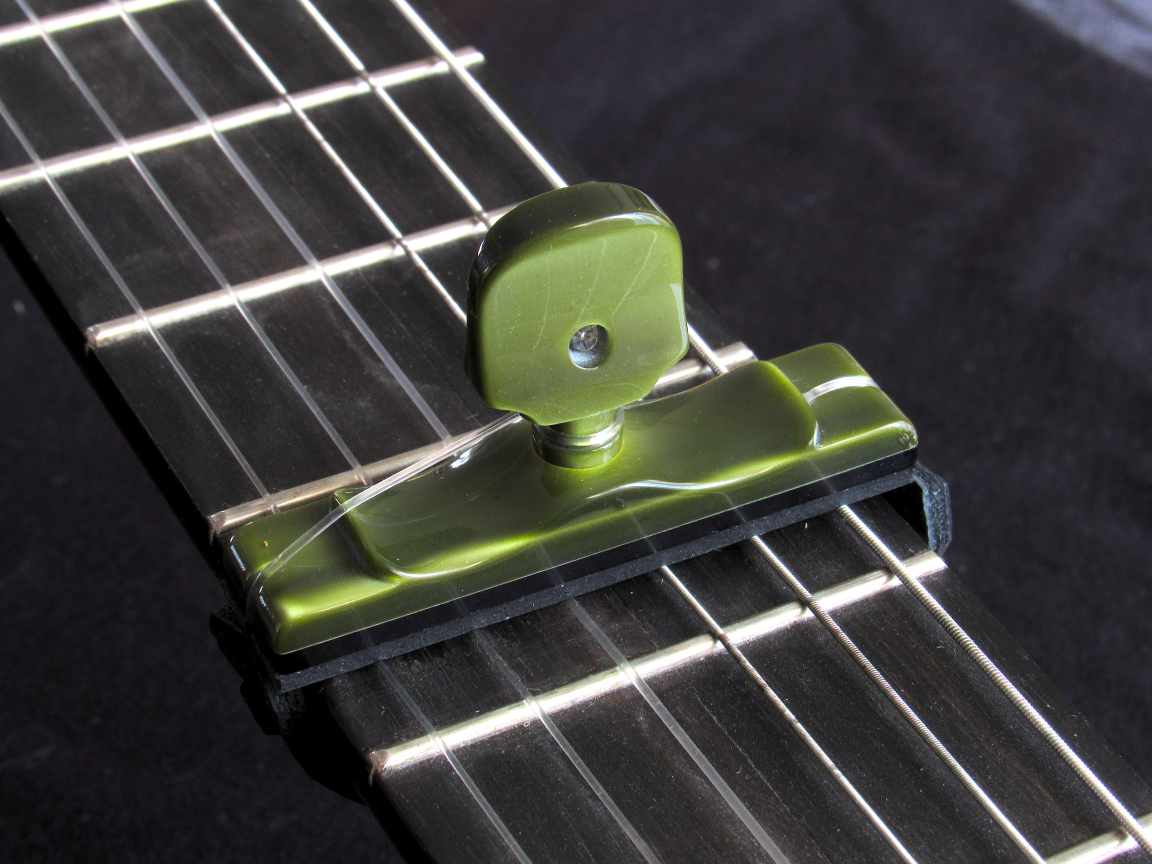 Cejillas de resina para guitarras